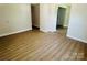 Spacious living area with modern flooring and neutral walls at 20016 Walter Henderson Rd, Cornelius, NC 28031