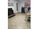 Spacious dining room with a fireplace and dining set with neutral décor at 202 Kenwood Ave, Cherryville, NC 28021
