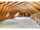 Spacious unfinished attic area with exposed beams, bright natural light, and endless design possibilities at 2027 Ellison Dr, Rock Hill, SC 29730