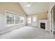 Bright bedroom featuring plush carpet, a fireplace, and ample natural light at 2027 Ellison Dr, Rock Hill, SC 29730