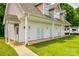 Exterior view of home with a walkway, lots of windows, and green lawn space at 2027 Ellison Dr, Rock Hill, SC 29730
