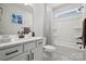 Modern bathroom features a single vanity, updated fixtures, and a shower-tub combo at 2045 Mantle Ridge Dr, Indian Trail, NC 28079