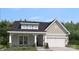 Charming single-Gathering home featuring stone accents and a two-car garage at 2045 Mantle Ridge Dr, Indian Trail, NC 28079