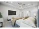 Spacious main bedroom showcases a large TV and access to the bathroom and closet at 2045 Mantle Ridge Dr, Indian Trail, NC 28079