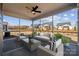 Relaxing screened patio with comfortable seating and great backyard views; perfect for outdoor enjoyment at 2045 Mantle Ridge Dr, Indian Trail, NC 28079