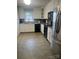 Well-maintained kitchen featuring white cabinets and modern appliances at 202 Kenwood Ave, Cherryville, NC 28021