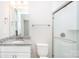 Bathroom featuring granite countertops, glass shower, and modern fixtures at 256 W Waterlynn Rd, Mooresville, NC 28117