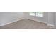 Carpeted bedroom with a window at 256 W Waterlynn Rd, Mooresville, NC 28117