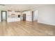 Spacious open-concept kitchen with a large island, stainless steel appliances and ample counter space at 256 W Waterlynn Rd, Mooresville, NC 28117