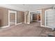Spacious living room with multiple doorways offering versatile layout options at 2809 N Main St, Kannapolis, NC 28081