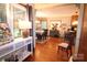 Bright dining room featuring hardwood floors, a table with six chairs, and stylish decor throughout at 2815 Penny Park Dr, Gastonia, NC 28052