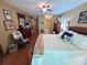 The main bedroom offers hardwood floors and is brightly lit by a ceiling fan at 2815 Penny Park Dr, Gastonia, NC 28052