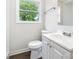 Bathroom with a modern sink, faucet, medicine cabinet, updated fixtures, and a window that gives natural light at 3121 Revolution Park Dr, Charlotte, NC 28217