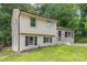 Charming home with a freshly painted brick and siding exterior, complemented by black shutters and well-maintained landscaping at 3121 Revolution Park Dr, Charlotte, NC 28217