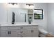 Bright bathroom features a double vanity, large mirror, and modern fixtures at 315 W Hoke W St, Landis, NC 28088