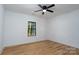 Bright bedroom featuring sleek ceiling fan, wood-look flooring, and ample natural light at 315 W Hoke W St, Landis, NC 28088