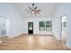 Bright living space with vaulted ceiling, hardwood floors, and bright white walls at 315 W Hoke W St, Landis, NC 28088
