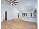 Bright living space with vaulted ceiling, hardwood floors, open to kitchen, great for entertaining at 315 W Hoke W St, Landis, NC 28088