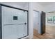 Subway tile shower features black trim and glass door at 315 W Hoke W St, Landis, NC 28088
