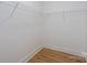 Walk-in closet with shelving and wooden floors at 315 W Hoke W St, Landis, NC 28088