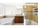 Bright bathroom with soaking tub and large glass shower at 3918 Halcyon Dr, Huntersville, NC 28078