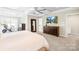Primary bedroom with an exercise bike, flat screen television, and natural light at 3918 Halcyon Dr, Huntersville, NC 28078