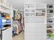 Walk-in closet with built in shelving and an abundance of storage for clothes and accessories at 3918 Halcyon Dr, Huntersville, NC 28078