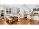 Open dining area with a backyard view adjacent to a modern living space at 3918 Halcyon Dr, Huntersville, NC 28078