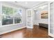 Inviting office space with French doors, trim detail, bench seating, and a large window offering natural light at 3918 Halcyon Dr, Huntersville, NC 28078