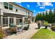 Beautiful brick patio with outdoor seating, ideal for enjoying outdoor living and gatherings at 3918 Halcyon Dr, Huntersville, NC 28078