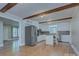 Modern kitchen featuring white cabinets, stainless steel appliances, and center island at 3951 Whitehall Dr, Charlotte, NC 28208