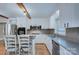 Updated kitchen featuring granite countertops, stainless appliances, and ample storage at 3951 Whitehall Dr, Charlotte, NC 28208