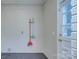 Mud room featuring a wall with hooks and a door to the backyard at 3951 Whitehall Dr, Charlotte, NC 28208