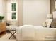 Bright bedroom offers ample light and comfortable furniture, creating a warm, inviting space at 4231 Skyboat Cir, Fort Mill, SC 29715
