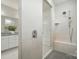 Bright bathroom featuring walk-in shower, granite vanity, and modern fixtures at 4527 Waylon Ave, Fort Mill, SC 29715