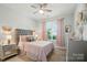 Lovely bedroom featuring pink accents, soft carpet, and lots of natural light at 4527 Waylon Ave, Fort Mill, SC 29715