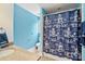 Cozy bathroom features blue walls with a decorative shower curtain and granite vanity at 469 Valley Run Dr, Waxhaw, NC 28173