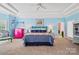 Airy bedroom boasts tray ceilings, soft blue walls, and bright pink accents at 469 Valley Run Dr, Waxhaw, NC 28173