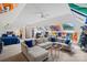 Spacious bonus room featuring a large sectional sofa, a bedroom area, and stylish decorations at 469 Valley Run Dr, Waxhaw, NC 28173