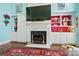 Cozy living room with fireplace, custom built-ins, and decorative accents at 469 Valley Run Dr, Waxhaw, NC 28173
