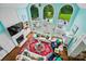Bright living room boasts high ceilings, large windows, a fireplace, and pool views at 469 Valley Run Dr, Waxhaw, NC 28173