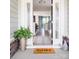 Inviting front porch with decor and view of the home's interior at 5107 Raging Creek Dr, Indian Trail, NC 28079