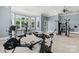 Well-equipped gym with treadmills, weight machines, and natural light from large windows at 5107 Raging Creek Dr, Indian Trail, NC 28079