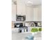 Gourmet kitchen with stainless steel appliances and a stone backsplash at 5107 Raging Creek Dr, Indian Trail, NC 28079