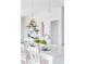 Kitchen island with seating and modern pendant lighting at 5107 Raging Creek Dr, Indian Trail, NC 28079