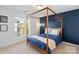 Well lit bedroom featuring 4 post bed frame, neutral color walls, and plenty of sunlight at 511 Donatello Ave, Charlotte, NC 28205
