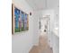Hallway featuring an art piece and leading into an open space at 511 Donatello Ave, Charlotte, NC 28205