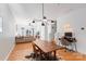 Open layout showcasing a dining area, living space, and convenient desk setup at 511 Donatello Ave, Charlotte, NC 28205
