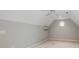 Attic space features a mini-split system, carpet floors and a geometric window at 5208 Black Oak Ln, Waxhaw, NC 28173