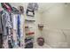 Walk-in closet with white wire shelving for organizing your wardrobe and accessories at 5208 Black Oak Ln, Waxhaw, NC 28173